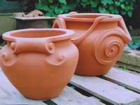 Scroll pot and snake pot